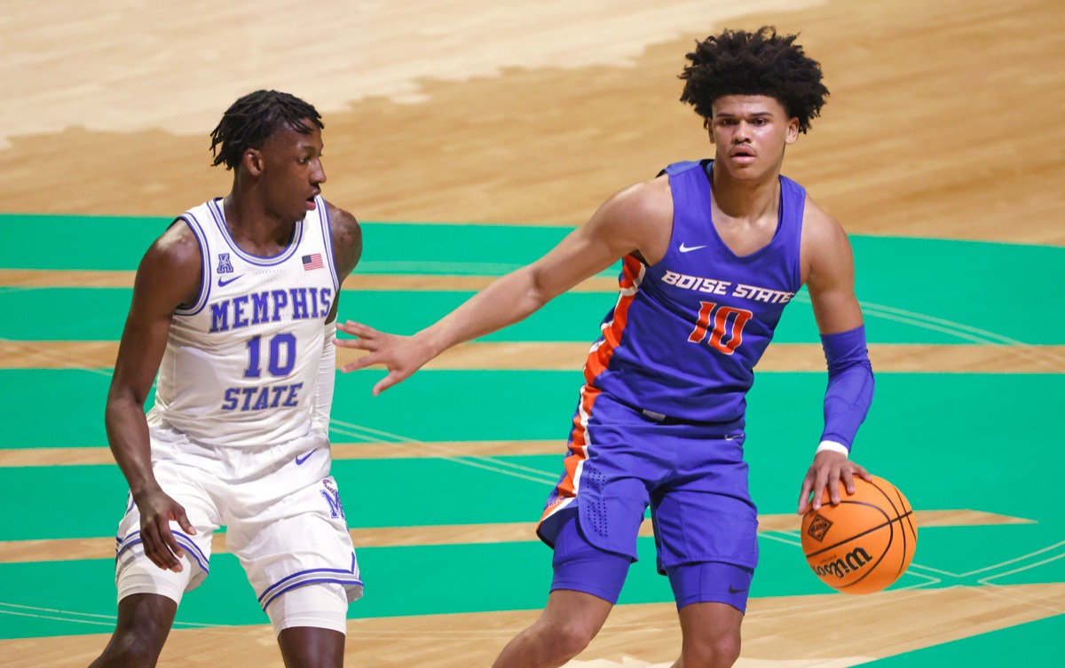 <strong>Boise State guard RayJ Dennis (10) drives against Memphis guard Damion Baugh (10) on March 25 in Denton, Texas.</strong> (Ron Jenkins/AP)