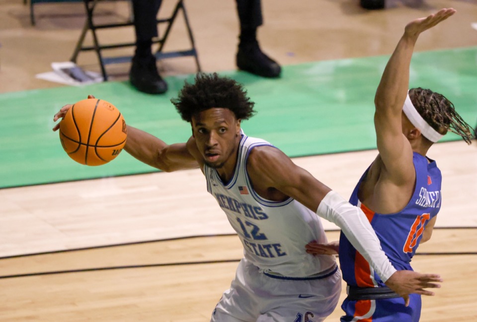 <strong>Memphis forward DeAndre Williams (12) drives past Boise State guard Marcus Shaver Jr. (0) in the NIT on March 25 in Denton, Texas.</strong> (Ron Jenkins/AP)