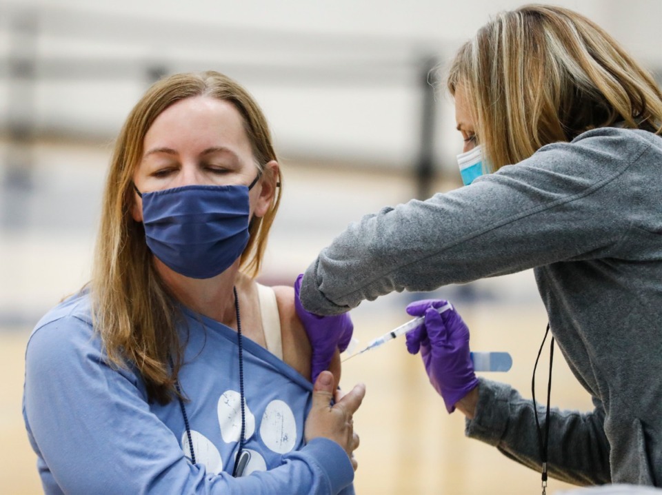 <strong>Jama Stump receives a COVID vaccination</strong>&nbsp;<strong>at Arlington High School on March 26.</strong> (Mark Weber/The Daily Memphian)