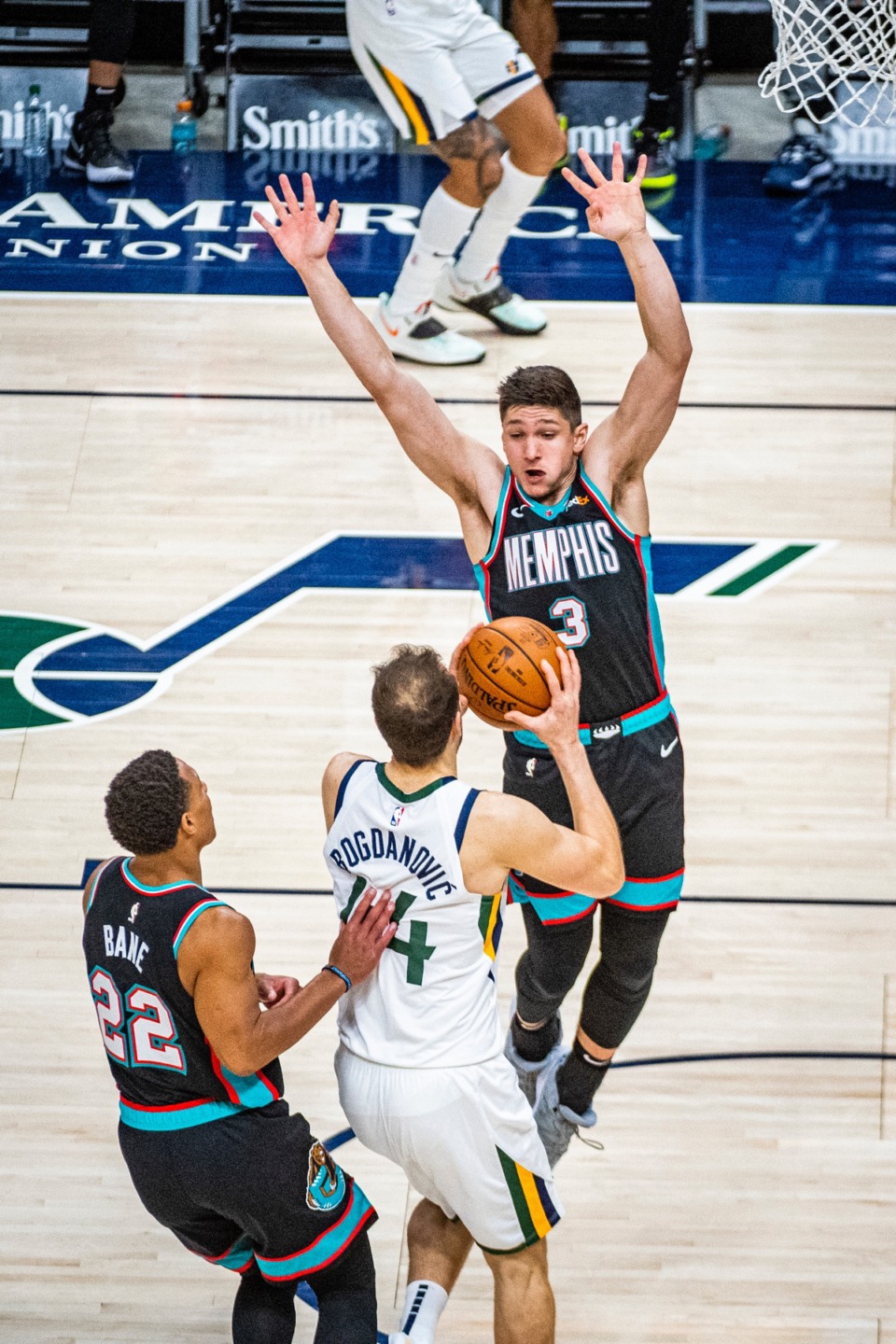 <strong>Grizzlies guard Grayson Allen (3) blocks a shot from Utah Jazz forward Bojan Bogdanovic (44)</strong> <strong>on March 26, in Salt Lake City.</strong> (Isaac Hale/AP)