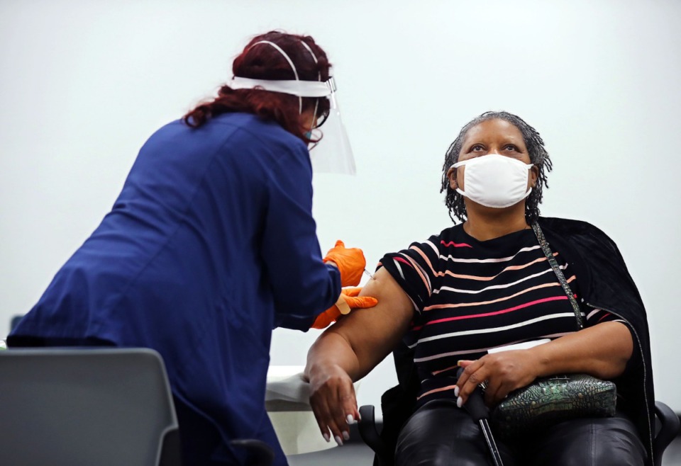 <strong>Brenda Echols, 70, (in a file photo) gets a COVID-19 vaccine at the Southwest Community College Whitehaven Center.</strong> (Patrick Lantrip/Daily Memphian)