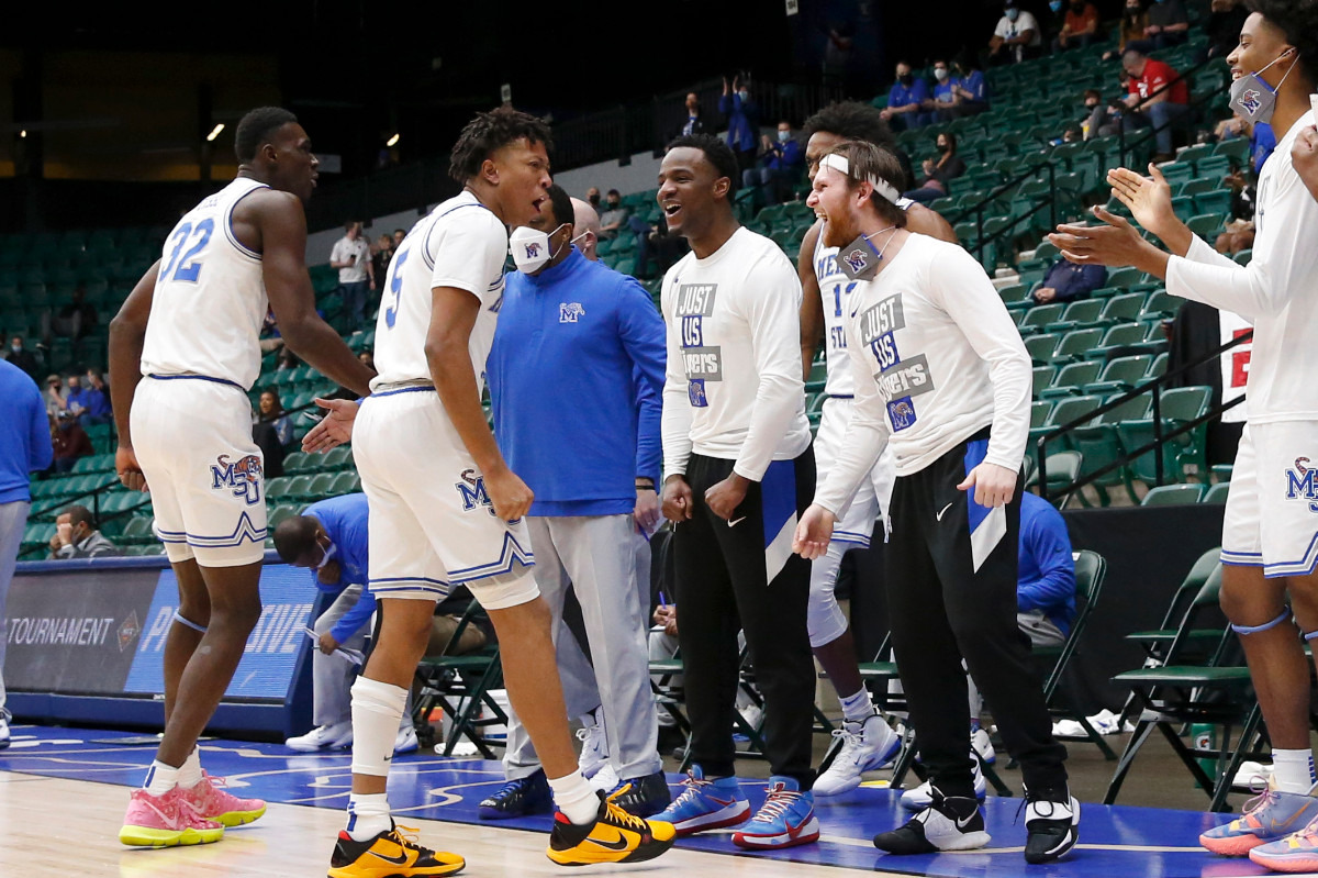 <strong>The Memphis team celebrates during Sunday&rsquo;s NIT championship game against Mississippi State.</strong> <strong>The Tigers pulled away in the second half to win 77-64.</strong> (Photo courtesy of the NCAA)