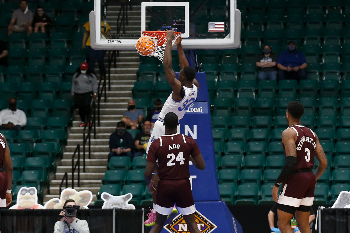 <strong>Memphis center Moussa Cisse dunks against Mississippi State during Sunday&rsquo;s NIT championship game in Frisco, Texas.</strong> (Photo courtesy of the NCAA)