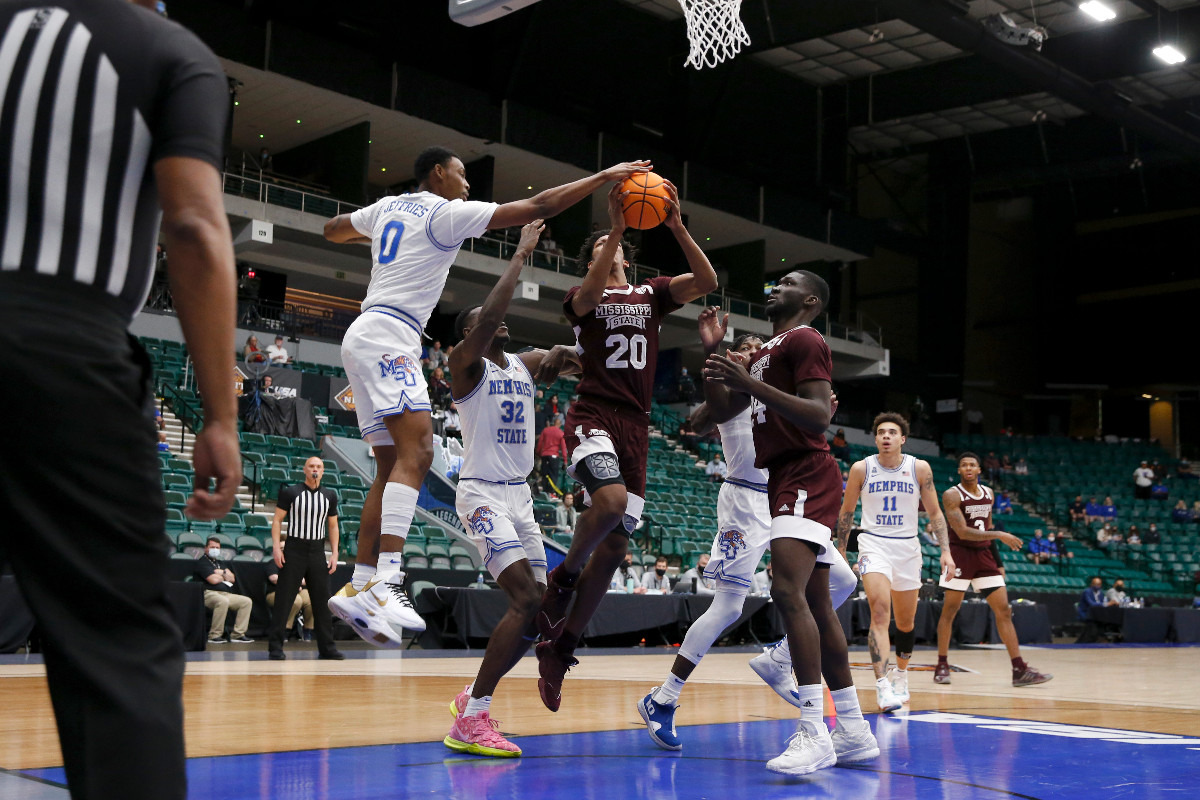 <strong>Memphis forward D.J. Jeffries blocks Mississippi State forward Derek Fountain&rsquo;s shot during Sunday&rsquo;s NIT championship game in Frisco, Texas.</strong> (Photo courtesy of the NCAA)