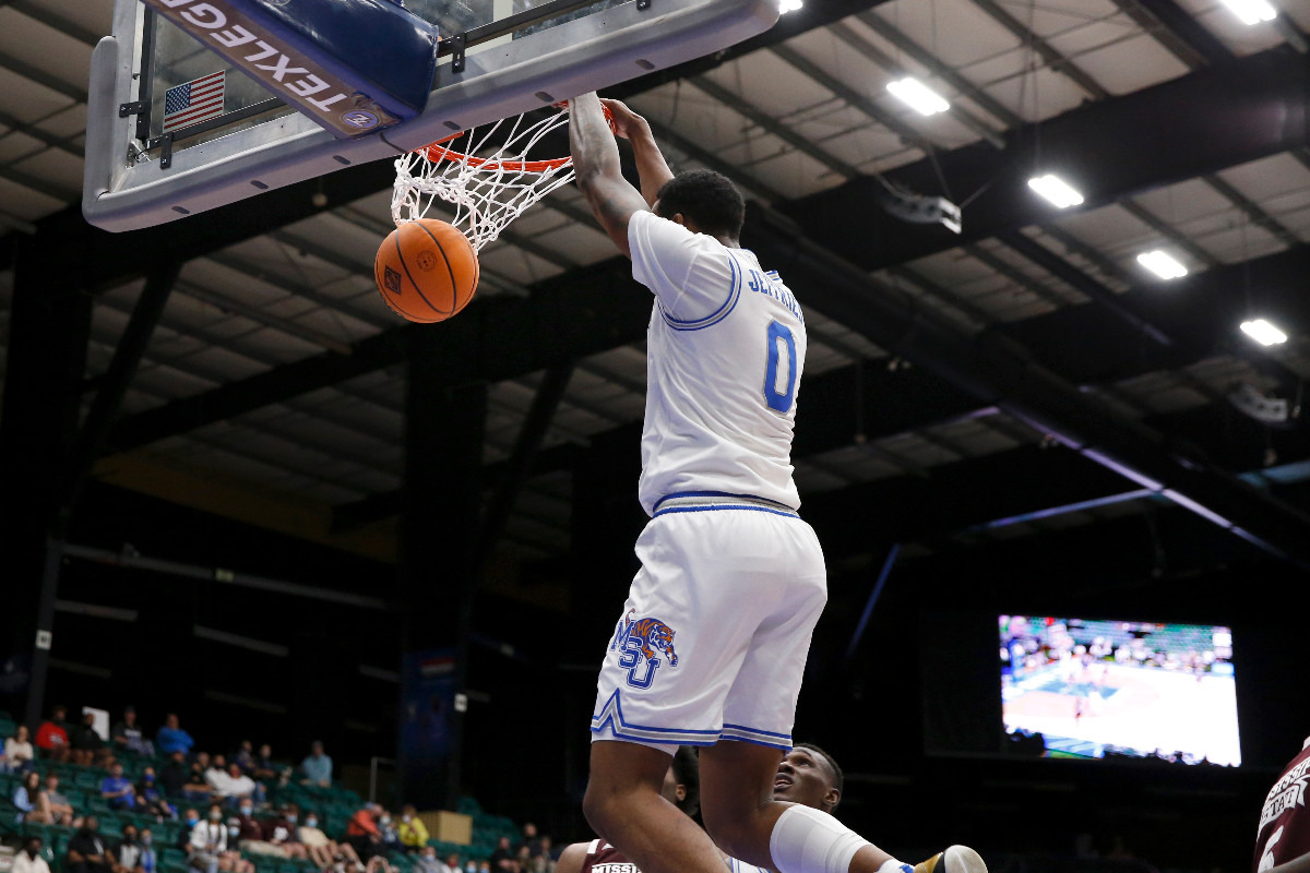 <strong>Memphis forward D.J. Jeffries dunks against Mississippi State during Sunday&rsquo;s NIT championship game in Frisco, Texas.</strong> (Photo courtesy of the NCAA)