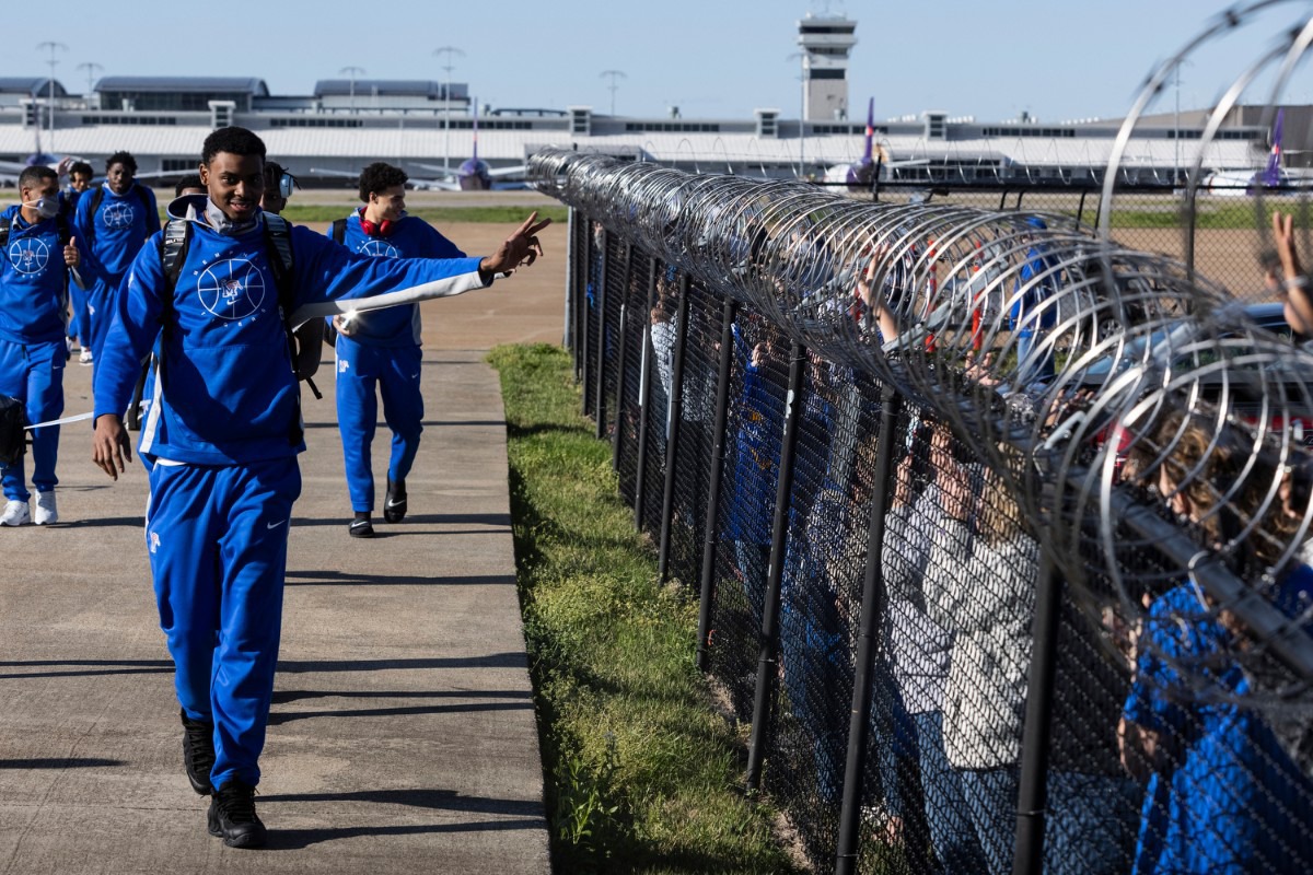 <strong>University of Memphis basketball players arrive to a heroes&rsquo; welcome at Wilson Air as they return from Frisco, Texas, where they won the National Invitation Tournament Sunday, March 28, 2021.</strong> (Brad Vest/Special to The Daily Memphian)