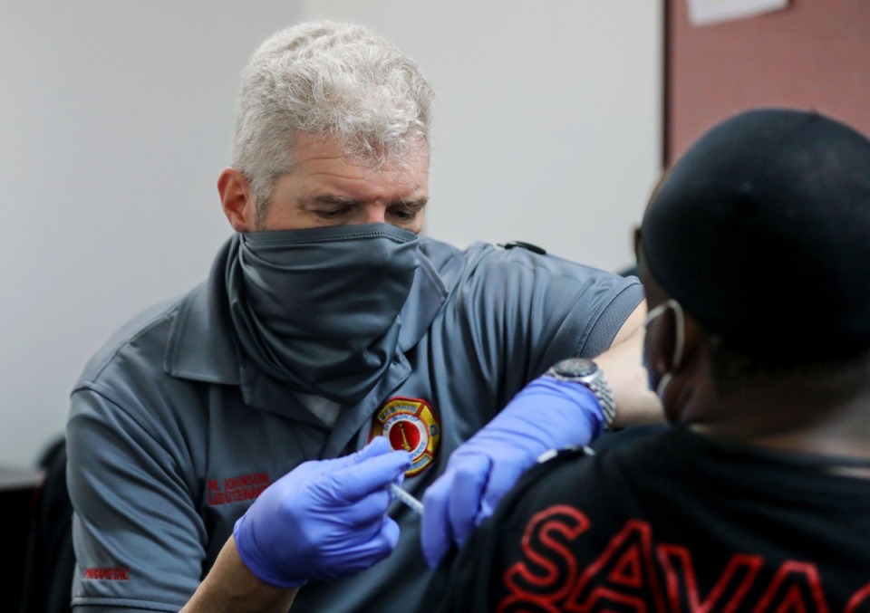 <strong>Lt. Mark Johnson administers a Johnson and Johnson COVID-19 vaccine at the Union Mission March 19, 2021.</strong> (Patrick Lantrip/Daily Memphian)