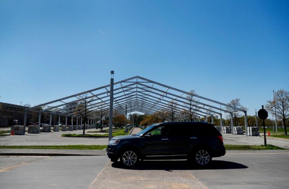 <strong>A large tent-like structure is erected at the Pipkin Building on Thursday, April 1, 2021. The tent will enable more vaccine to be delivered to area resident</strong>s. (Mark Weber/The Daily Memphian)