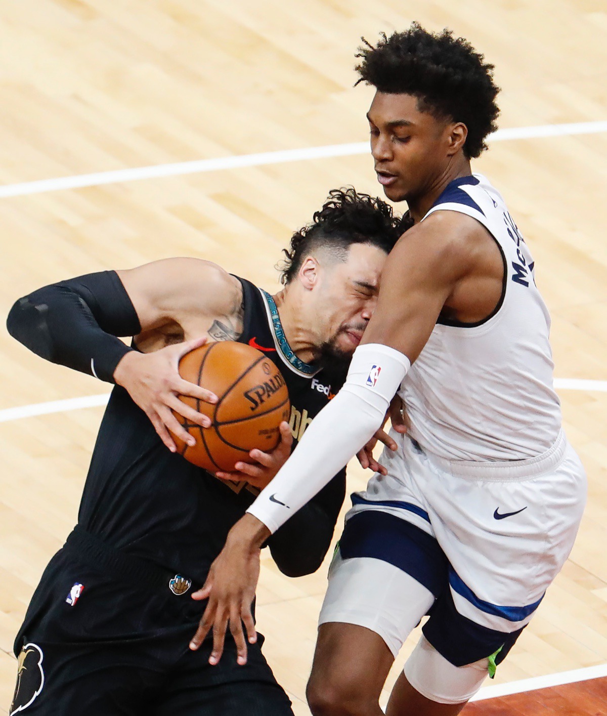 <strong>Grizzlies guard Dillion Brooks (left) drives into Minnesota&rsquo;s Jaden McDaniels (right) on April 2.</strong> (Mark Weber/The Daily Memphian)