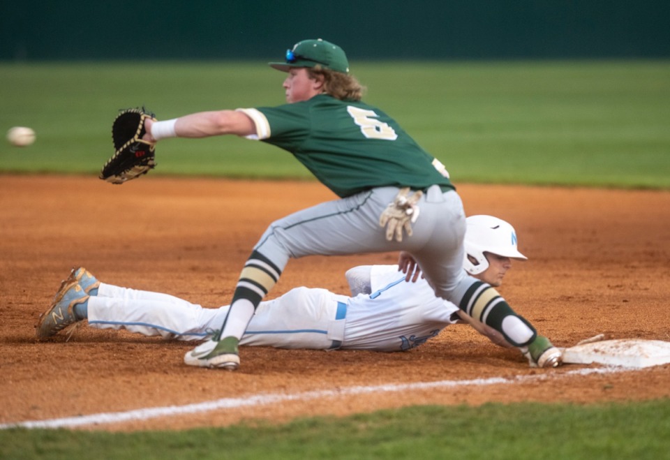 <strong>FACS first baseman Tyler Kamler (5) reaches for the throw as Northpoint's Anthony Zarlingo (1) slides back to first base Monday in Southaven.</strong> (Greg Campbell/Special to The Daily Memphian)