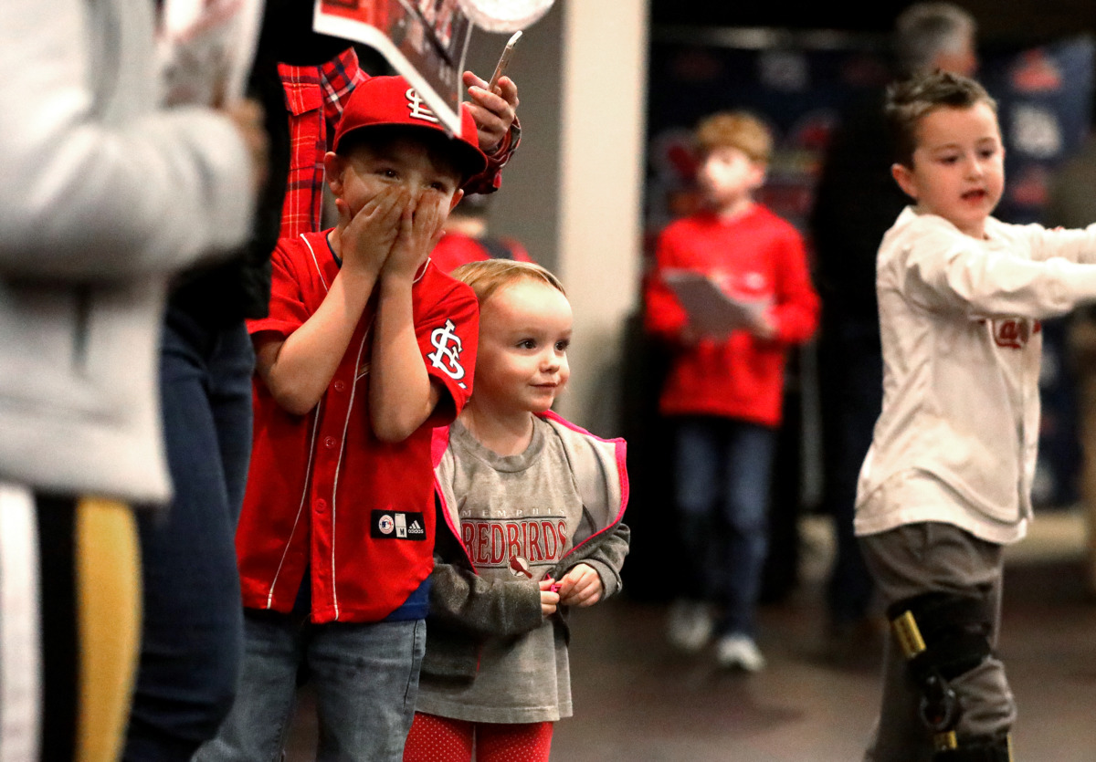 <strong>Russell Chailland (left), 7, and his sister Madison Chailland (right), 3, gasp as Rockey the Redbird runs into a crowd during the Cardinals Caravan event on Friday, Jan. 18, 2019.</strong>&nbsp;(Houston Cofield/Daily Memphian)