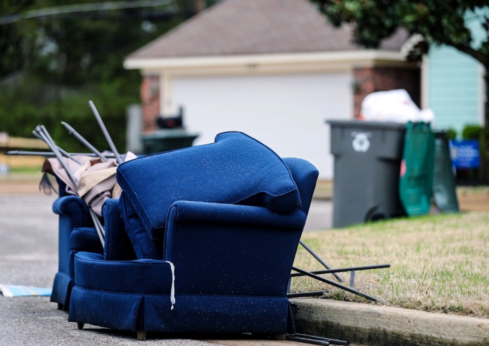 <strong>A couch and other trash litter the curb in Cordova on March 23.&nbsp;The city is current on garbage collections in the Cordova, Hickory Hill and East Memphis areas, according to city Chief Operating Officer Doug McGowen.</strong> (Patrick Lantrip/Daily Memphian)