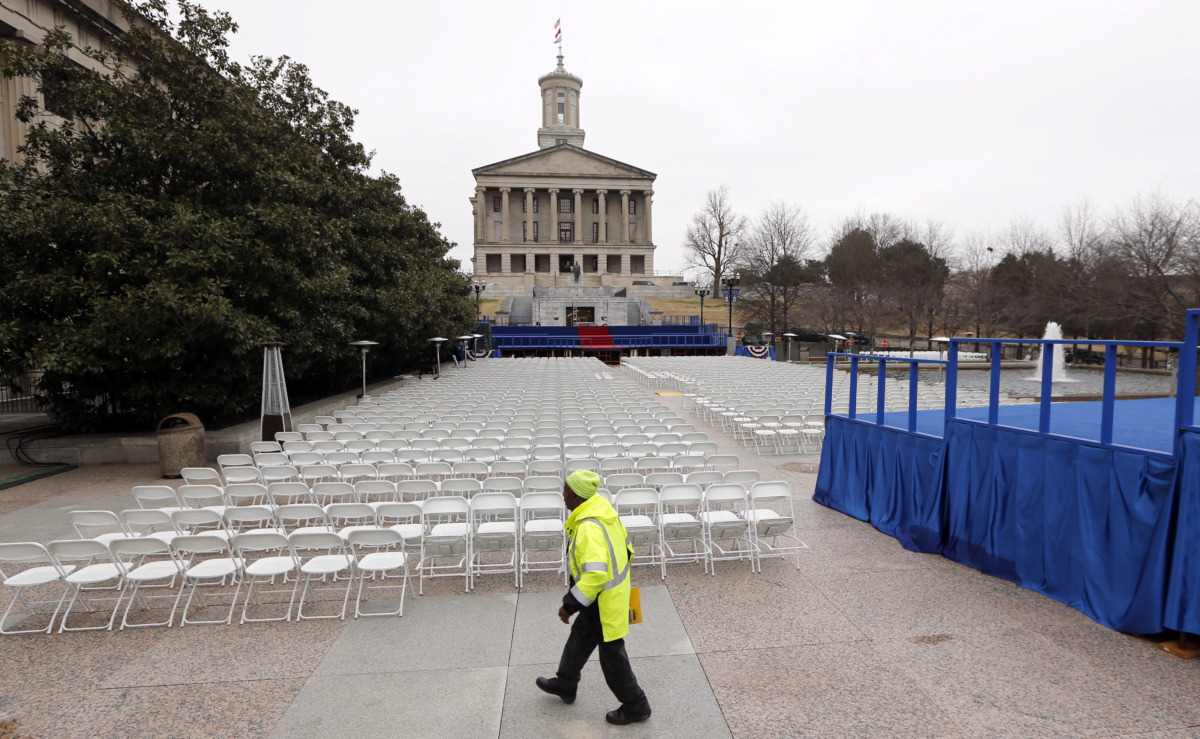 <strong>A man walks across War Memorial Plaza near the Tennessee State Capitol Friday, Jan. 18, 2019, in Nashville, Tenn., where preparations have been made for the inauguration of Tennessee Gov.-elect Bill Lee on Saturday. Lee's inauguration is being moved indoors to the War Memorial Auditorium because of forecasts for weekend rain and thunderstorms.</strong> (AP Photo/Mark Humphrey)
