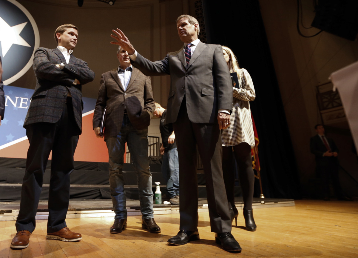 <strong>Tennessee Gov.-elect Bill Lee, center, talks with staff during a walk-through for his inauguration in War Memorial Auditorium Friday, Jan. 18, 2019, in Nashville, Tenn. Lee is moving his inauguration to the indoor venue amid forecasts for weekend rain and thunderstorms on Saturday.</strong> (AP Photo/Mark Humphrey)