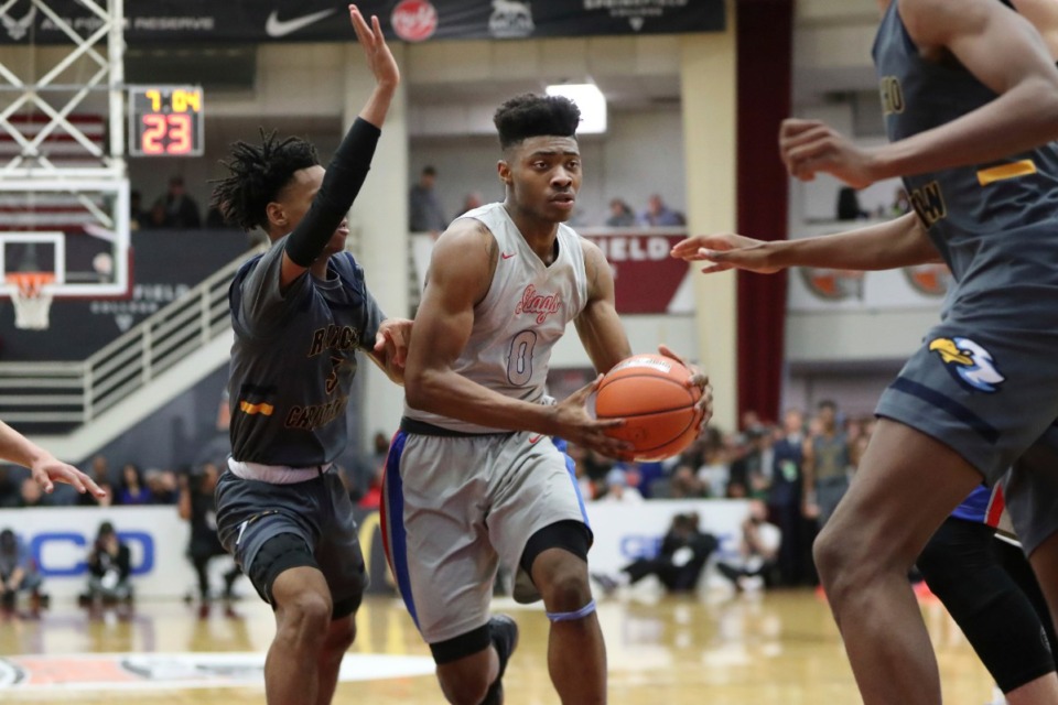 <strong>Earl Timberlake during a high school basketball game during the January 2020 Hoophall Classic.</strong> (AP Photo/Gregory Payan)