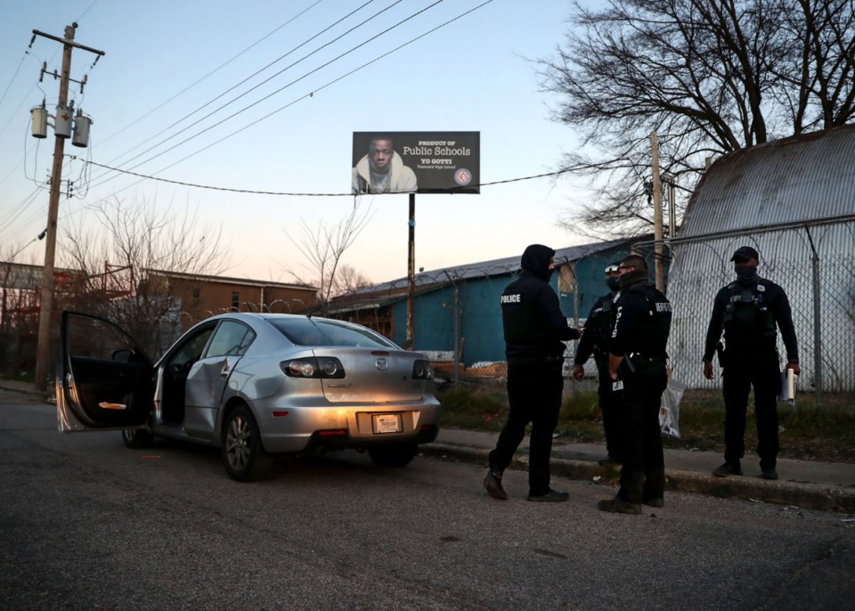 <strong>Officers discuss a recent arrest on March 6.&nbsp;With 2020 being the deadliest year in decades for homicides in the city, MPD relaunched its two Criminal Apprehension Teams, or CATs, a violent-crime-reduction operation.&nbsp;</strong>(Patrick Lantrip/Daily Memphian)