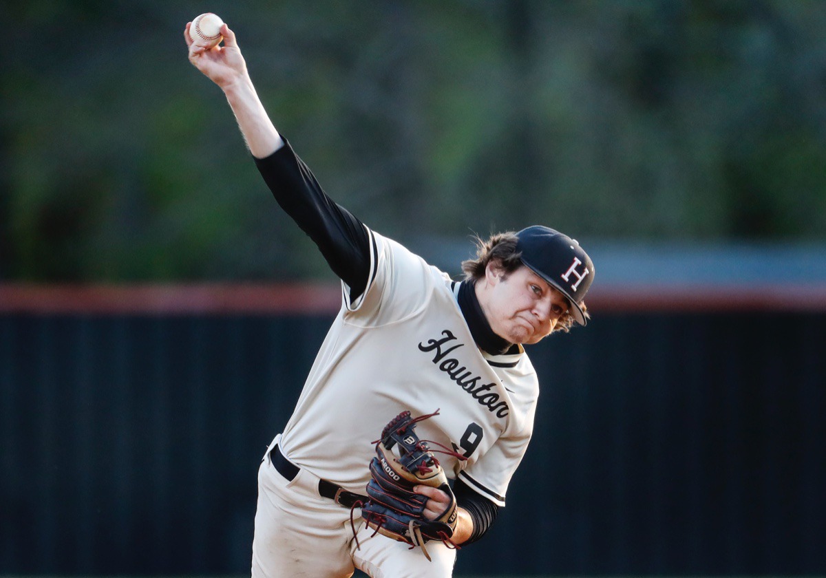 <strong>Houston starting pitcher Brady Jones makes a throw to home plate against Collierville on April 8.</strong> (Mark Weber/The Daily Memphian)