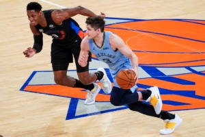 <strong>Grizzlies guard Grayson Allen (3) drives against New York Knicks guard R.J. Barrett (9) on April 9, 2021, at Madison Square Garden in New York.</strong> (Mary Altaffer/AP pool)