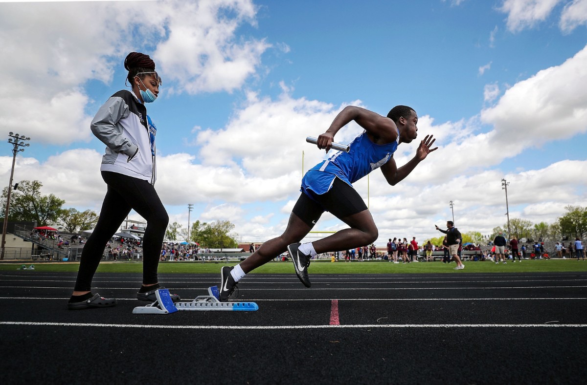 <strong>Harding's Jordan Jarrett starts off the block in the men's 4x200 meter relay at the Houston Track and Field Classic at Houston High School April 10, 2021.</strong> (Patrick Lantrip/Daily Memphian)