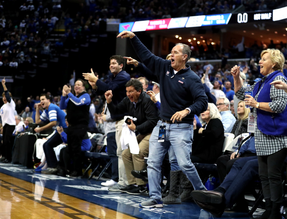 <strong>University of Memphis Tigers fans react to guard Tyler Harris (1) draining a long three-point basket during a game against Southern Methodist University.</strong> (Houston Cofield/Daily Memphian)