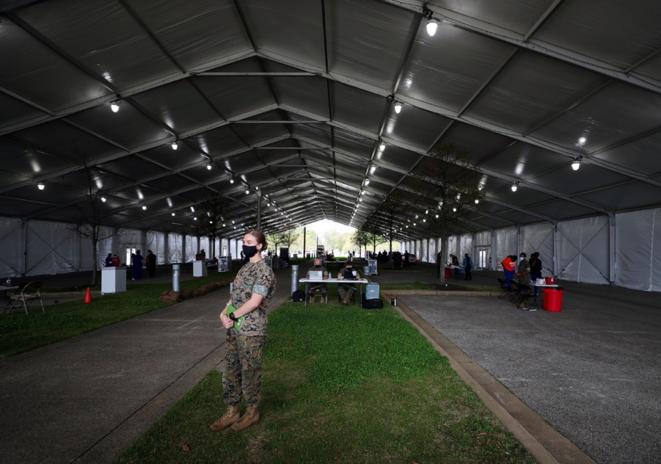 <strong>Lt. Sydney Murkins stands inside the tent erected outside of the Pipkin Building to deliver COVID-19 vaccines April 7, 2021.</strong> (Patrick Lantrip/Daily Memphian)