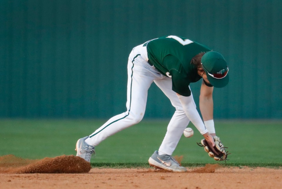 <strong>Briarcrest shortstop Peyton Moore misses an infield hit by MUS on April 12.</strong> (Mark Weber/The Daily Memphian)