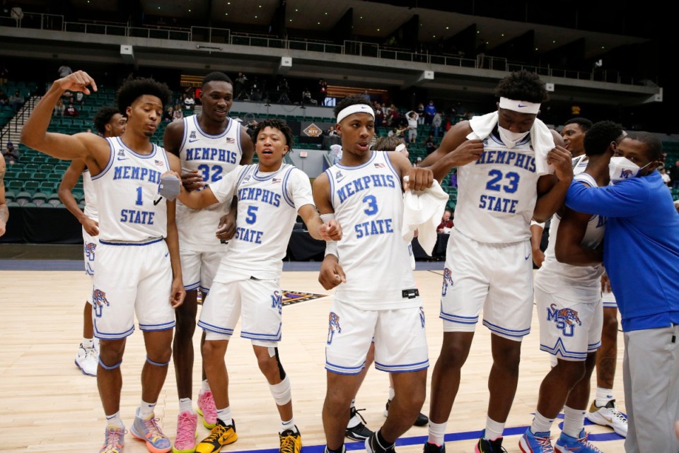 <strong>Jayden Hardaway (1), Mousse Cisse (32), Boogie Ellis (5), Landers Nolley (3) and Malcolm Dandridge (23) celebrate winning the NIT basketball tournament March 28, 2021.</strong> (Courtesy NCAA)