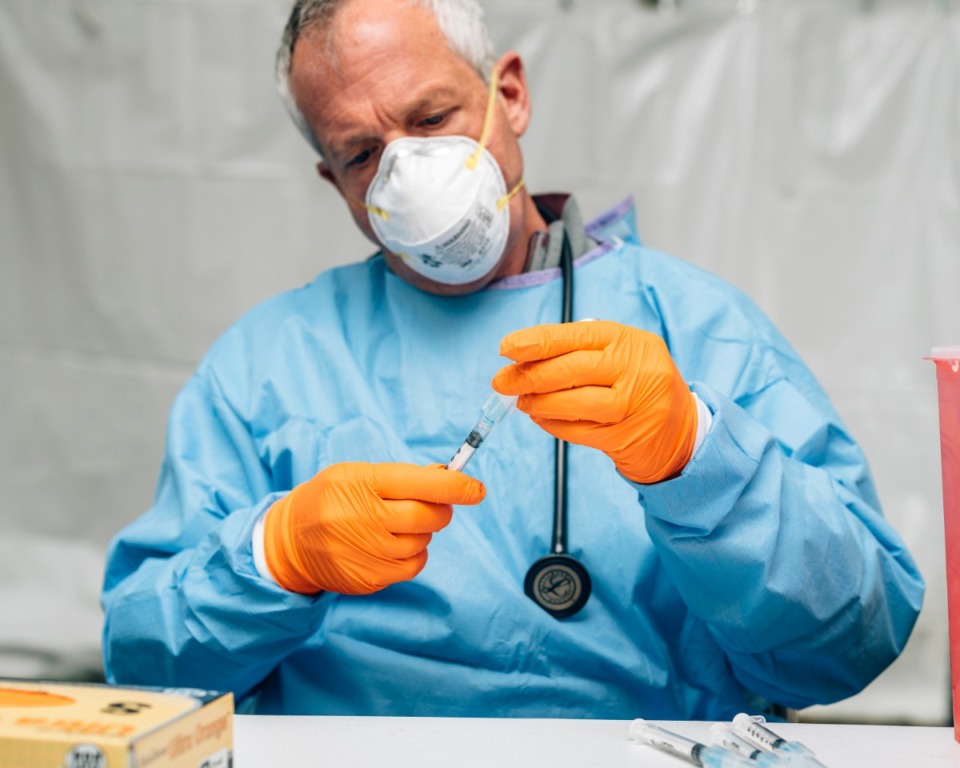 <strong>A health care worker prepares a coronavirus vaccine.</strong> (Houston Cofield/Special To The Daily Memphian file)