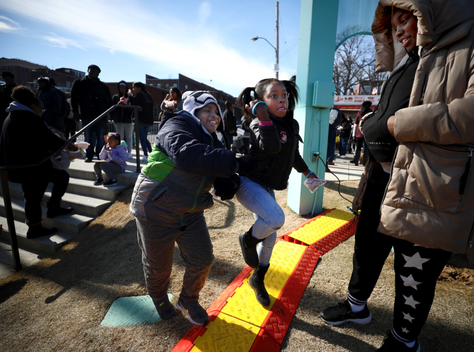 <strong>Radio station 88.5 provided tunes for Martez Taylor (from left), 8;&nbsp; Brooke Tolbert, 6, and Caitlin Taylor, 12, to dance to in front of the National Civil Rights Museum on Martin Luther King Jr. Day 2019. The museum hosted activities and programming on the national holiday, including live concerts, speakers and food trucks.&nbsp;</strong>(Houston Cofield/Daily Memphian)