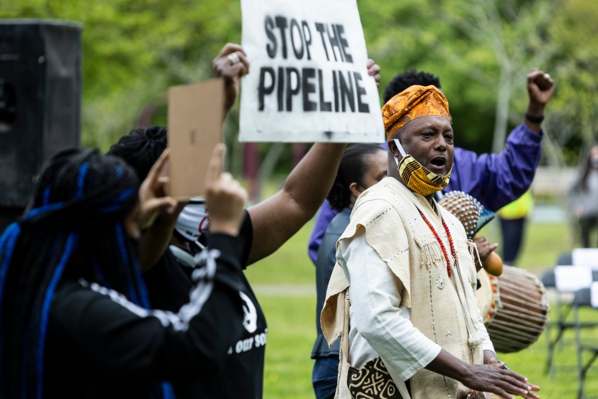 <strong>Ekpe Abioto plays the djembe during a rally supporting the Memphis Community Against the Pipeline at Alonzo Weaver Park.</strong> (Brad Vest/Special to The Daily Memphian)