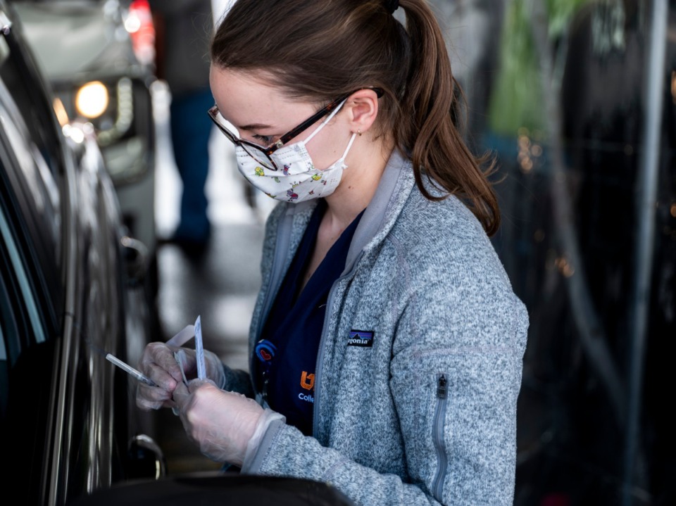 <strong>Lynley Matthews, a second-year UTHSC medical student, prepares to administer a vaccination on Sunday, Feb. 21, at Southwest Tennessee Community College - Whitehaven Center.</strong>&nbsp;(Brad Vest/Special to The Daily Memphian file)