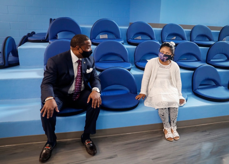 <strong>Shelby County Schools Superintendent Joris M. Ray (left) chats with Alcy Elementary School fourth grader Yoselyn Mejia, 9, on Wednesday, April 7. Ray&rsquo;s proposed <a href="https://dailymemphian.com/article/21368/joris-ray-shelby-county-schools-reimagine-901-state-of-the-district" target="_blank" rel="noopener">Reimagine 901 plan</a> will include two school closures.</strong> (Mark Weber/The Daily Memphian file)