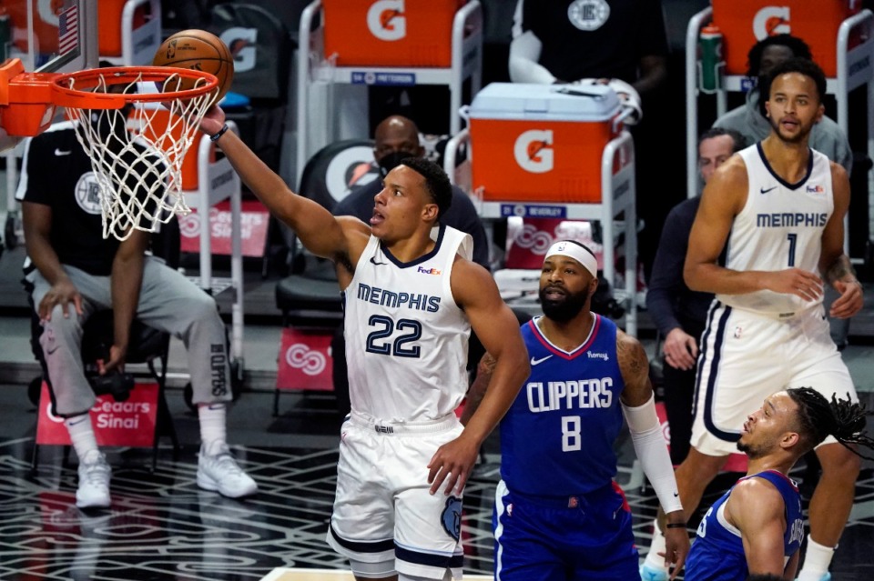 <strong>Memphis Grizzlies guard Desmond Bane (22) scores past Los Angeles Clippers forward Marcus Morris Sr. during the first half of an NBA basketball game Wednesday, April 21, 2021, in Los Angeles.</strong> (Marcio Jose Sanchez/AP)
