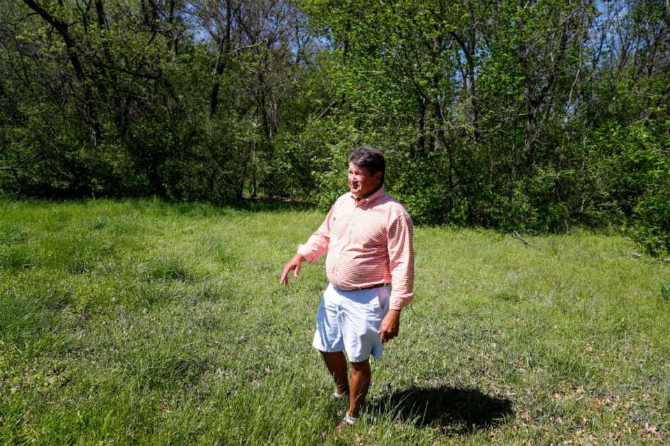 <strong>David Skinner walks his family&rsquo;s property near Poplar Avenue on April 8, 2021 in Germantown. Skinner has been trying to get his property that has been in the family for 100 years rezoned for commercial use, but Monday the aldermen denied his request.</strong> (Mark Weber/The Daily Memphian)