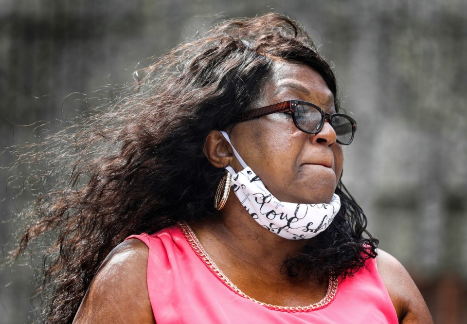<strong>Cheryl Wallace sheds tears while speaking about her younger brother Vern Braswell, a former Memphis principal convicted of killing his wife in 2005, outside the Odell Horton Federal Building on Monday, May 3, 2021. Local activists, family and friends held a press conference to discuss new evidence in his case and also their continued effort to get Braswell out of prison on compassionate release, citing his cancer diagnosis and the pandemic.</strong> (Mark Weber/The Daily Memphian)