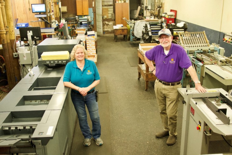 Office manager Lisa Smith (left) and owner Steve Davis run C.A. Davis Printing Co., which turned 100 on Thursday, May 6, 2021. (Tom Bailey/Daily Memphian)