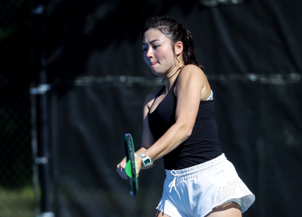 <strong>Hutchison's Stephanie Woodbury employs her backand during a tennis match at Memphis University School May 5, 2021.</strong> (Patrick Lantrip/Daily Memphian)