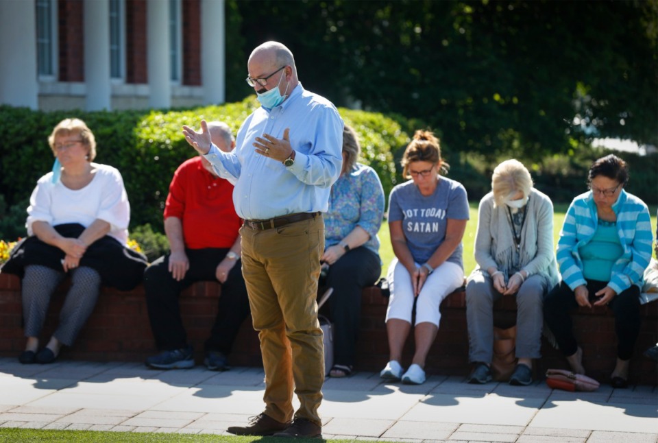 <strong>Pastors from Central Church, The Orchard Church, New Direction Christian Church, Collierville First Baptist Church, Grace Hill Church and Highpoint Church led residents in praying.</strong> (Mark Weber/The Daily Memphian)