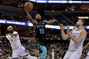 <span><strong>Charlotte Hornets guard Kemba Walker (15) shoots between Memphis Grizzlies guard Mike Conley (11) and center Marc Gasol on Wednesday, Jan. 23, 2019, in Memphis, Tenn.</strong> (AP Photo/Brandon Dill)</span>