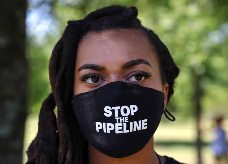 Victoria Terry listened to the speakers during a rally against the Byhalia Pipeline at Alonzo Weaver Park on May 1, 2021. (Patrick Lantrip/Daily Memphian)