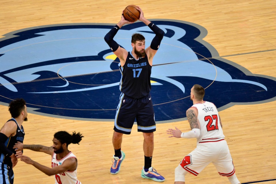 <strong>Memphis Grizzlies center Jonas Valanciunas (17) handles the ball ahead of Chicago Bulls center Daniel Theis (27) in the second half of an NBA basketball game&nbsp; April 12, 2021, at FedExForum.</strong> (Brandon Dill/AP file)