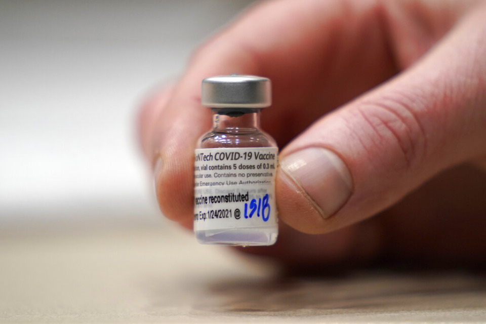 <strong>This Jan. 24, 2021, file photo shows a vial of the Pfizer vaccine for COVID-19 in Seattle. U.S. regulators on Monday, May 10, 2021, expanded use of Pfizer's shot to those as young as 12, sparking a race to protect middle and high school students before they head back to class in the fall.</strong> (AP Photo/Ted S. Warren, File)