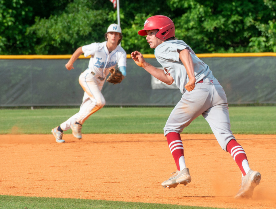 <strong>ECS's Bo Dawson makes a jump for second base against Northpoint's Anthony Zarlingo in the fourth inning of their game at St. George's Independent School, Monday, May 10, 2021.</strong> (Greg Campbell/Special to The Daily Memphian)
