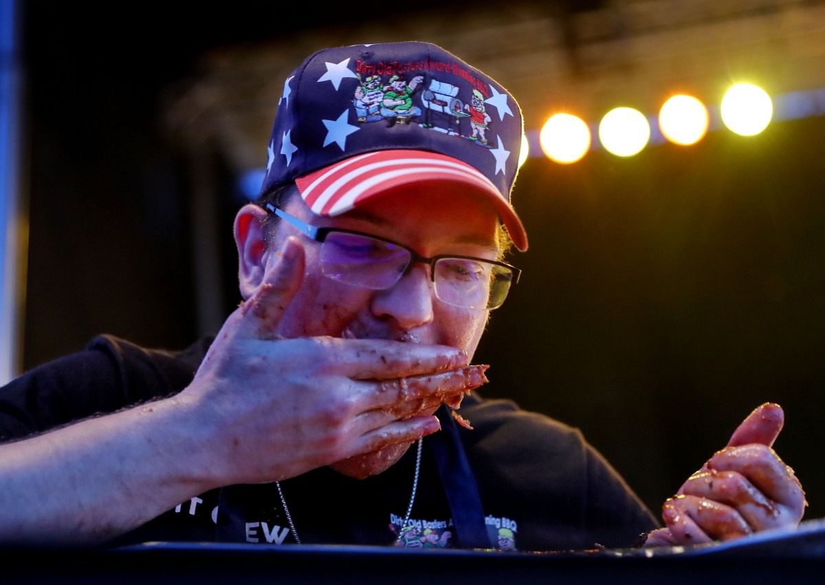 <strong>A contestant competes in the Rib Rumble rib eating contest.</strong> (Patrick Lantrip/Daily Memphian)