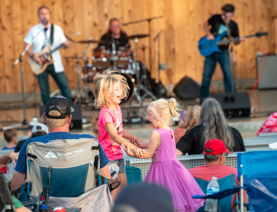 <strong>Teagan Cowgill, 6 and Shannon Cowgill, 4, loves to dance to the music at The Crossings Amphitheater at Forrest Street Park by the Brian Johnson Band in Arlington, Saturday, May 15, 2021.</strong> (Greg Campbell/Special to The Daily Memphian)