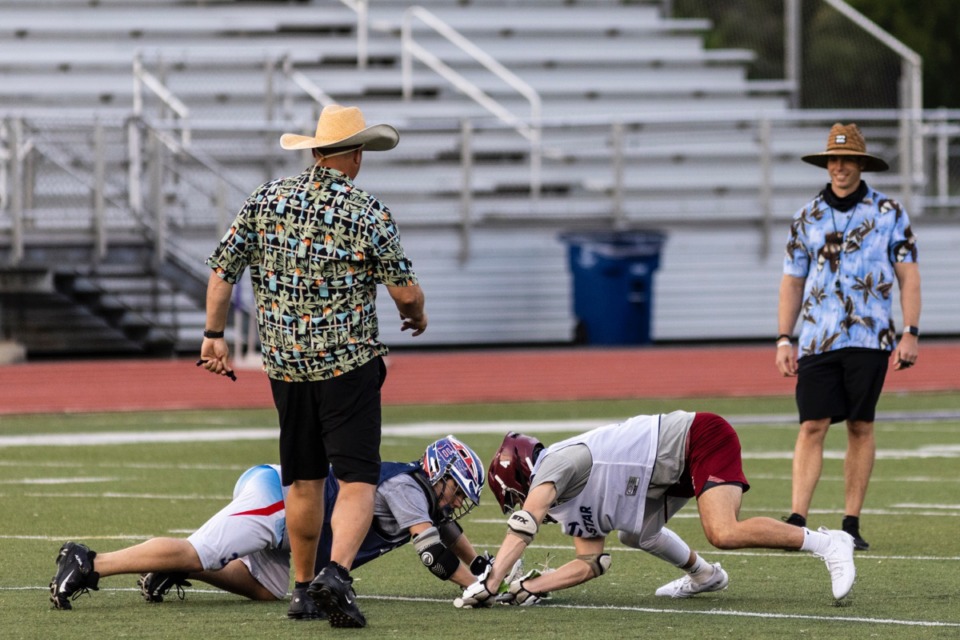 <strong>Austin Eisengart, left, and Eli Grizzard, right, battle for the ball during the first annual lacrosse all-star game&nbsp;at CBHS May 18.</strong> (Brad Vest/Special to The Daily Memphian