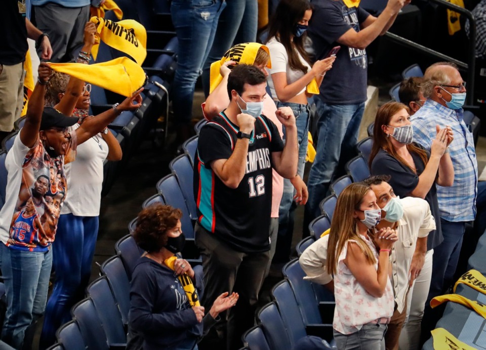 <strong>Memphis Grizzlies fans celebrate a 100-96 victory over the San Antonio Spurs on Wednesday, May 19, 2021.</strong> (Mark Weber/The Daily Memphian)