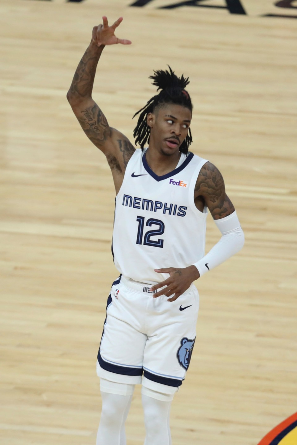 <strong>Grizzlies guard Ja Morant (12) reacts after a three-pointer agains tthe Golden State Warriors in San Francisco, Friday, May 21, 2021.</strong> (Jed Jacobsohn/AP)