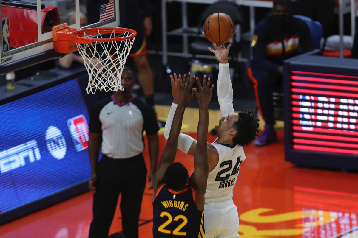 <strong>Dillon Brooks (24) shoots against Golden State&rsquo;s Andrew Wiggins (22) during the Western Conference play-in game in San Francisco Friday, May 21, 2021.</strong> (Jed Jacobsohn/AP)