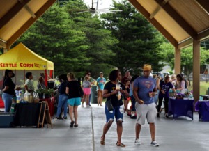 <strong>Shoppers browse Saturday, May 22 at Bartlett Station Farmers Market, which has moved to its new location at A. Keith McDonald Pavilion at Freeman Park.</strong> (Patrick Lantrip/Daily Memphian)